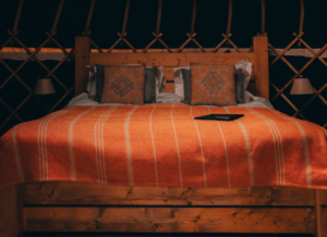 luxury yurt interior with made up double bed
