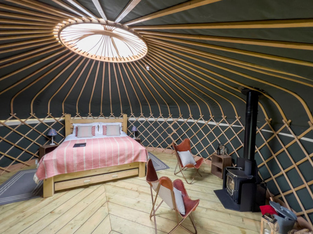Interior shot of the Bee Orchid Yurt at Raynham Estate Glamping