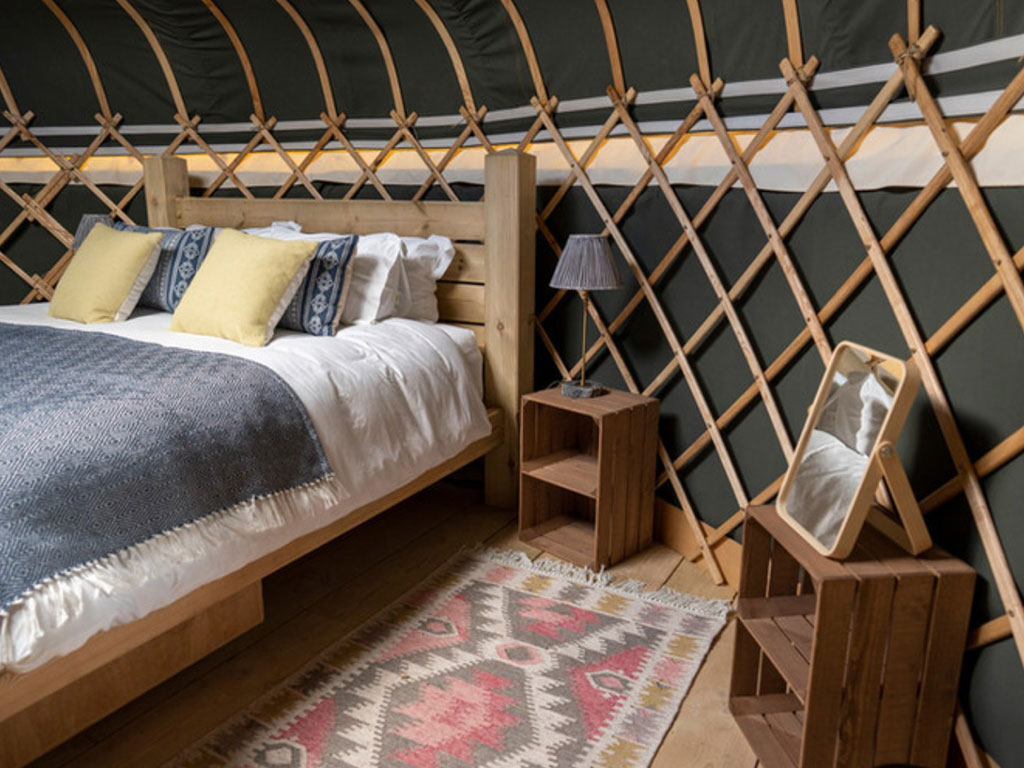 An exterior shot of the Foxglove Yurt at Raynham Estate Glamping