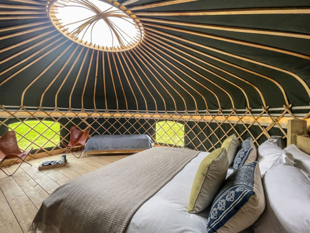 An exterior shot of the Foxglove Yurt at Raynham Estate Glamping